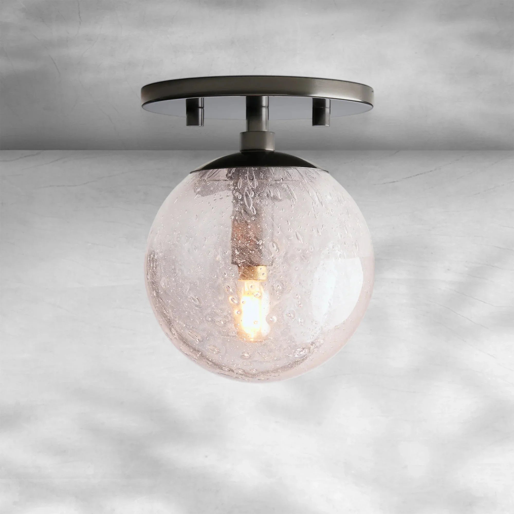 Mandoza Hand‑Blown Glass Wall Sconce with Rustic Industrial Charm