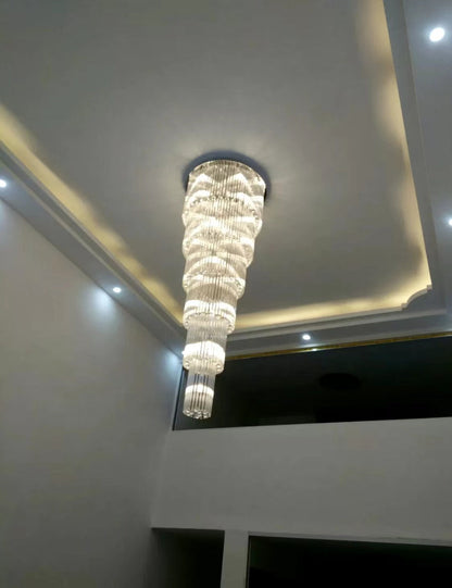 luxury, extra large, oversized,crystal, flush mount chandeliers, high-ceiling space,staircase, grand living room, duplex, luxurious 2-floor loft, entryway, deluxe, foyer and hotel lobby.