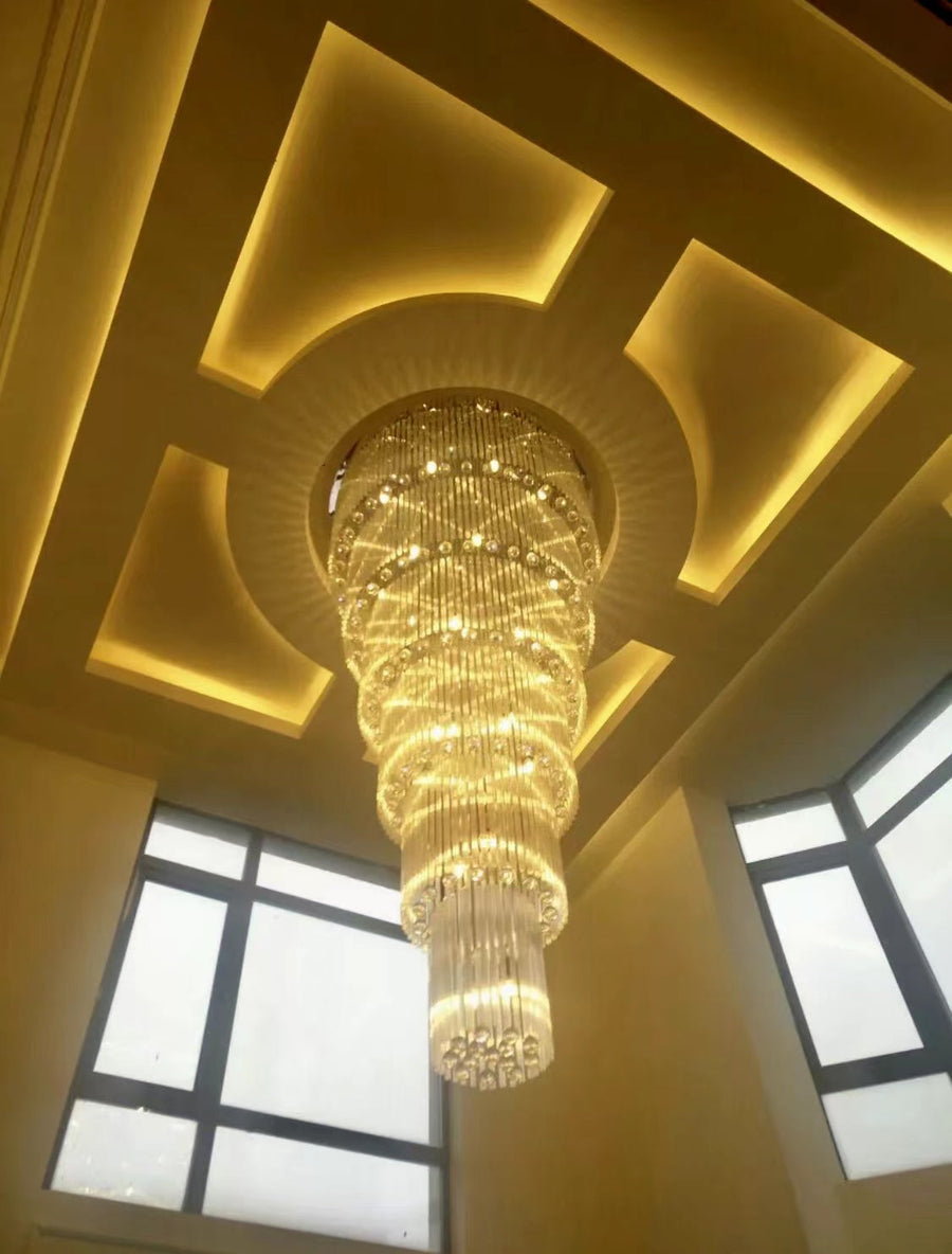 luxury, extra large, oversized,crystal, flush mount chandeliers, high-ceiling space,staircase, grand living room, duplex, luxurious 2-floor loft, entryway, deluxe, foyer and hotel lobby.