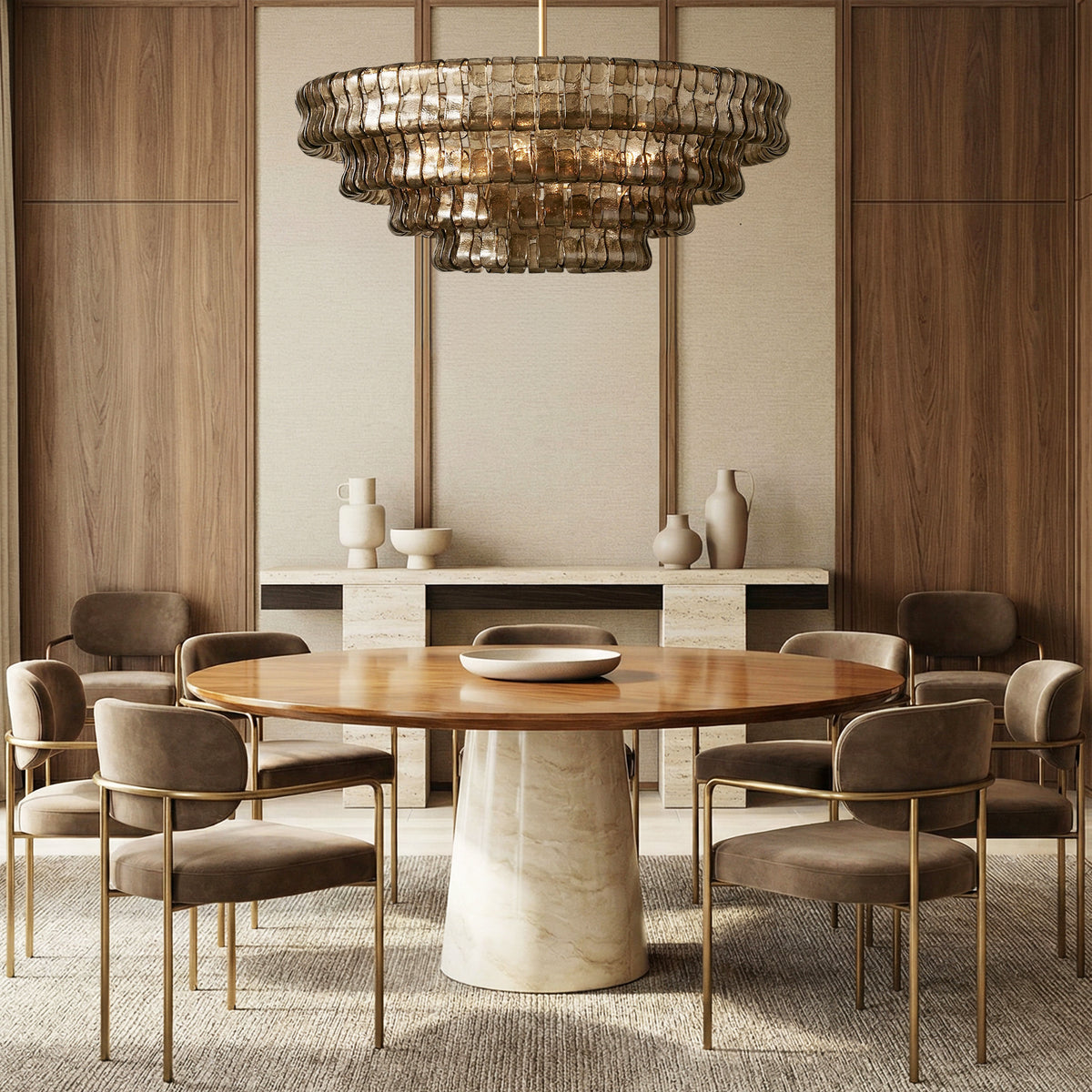 Givrelle round chandelier above a round table in a modern wood-panelled dining room