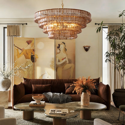 Givrelle round chandelier over the coffee table in a cozy brown-toned living room