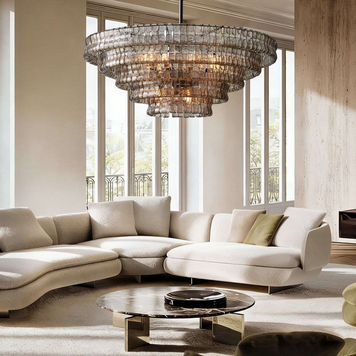 Givrelle round chandelier over a curved sofa in a contemporary living room