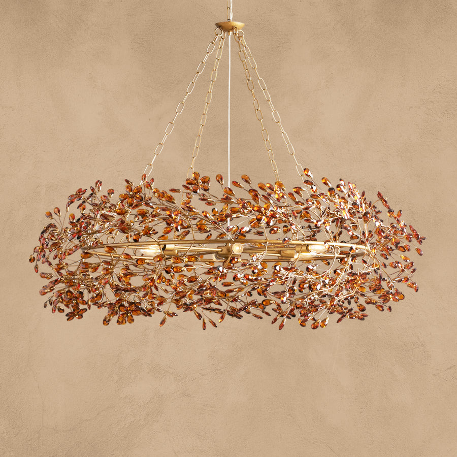 Faverelle chandelier in red-copper finish, crystal crown, lit