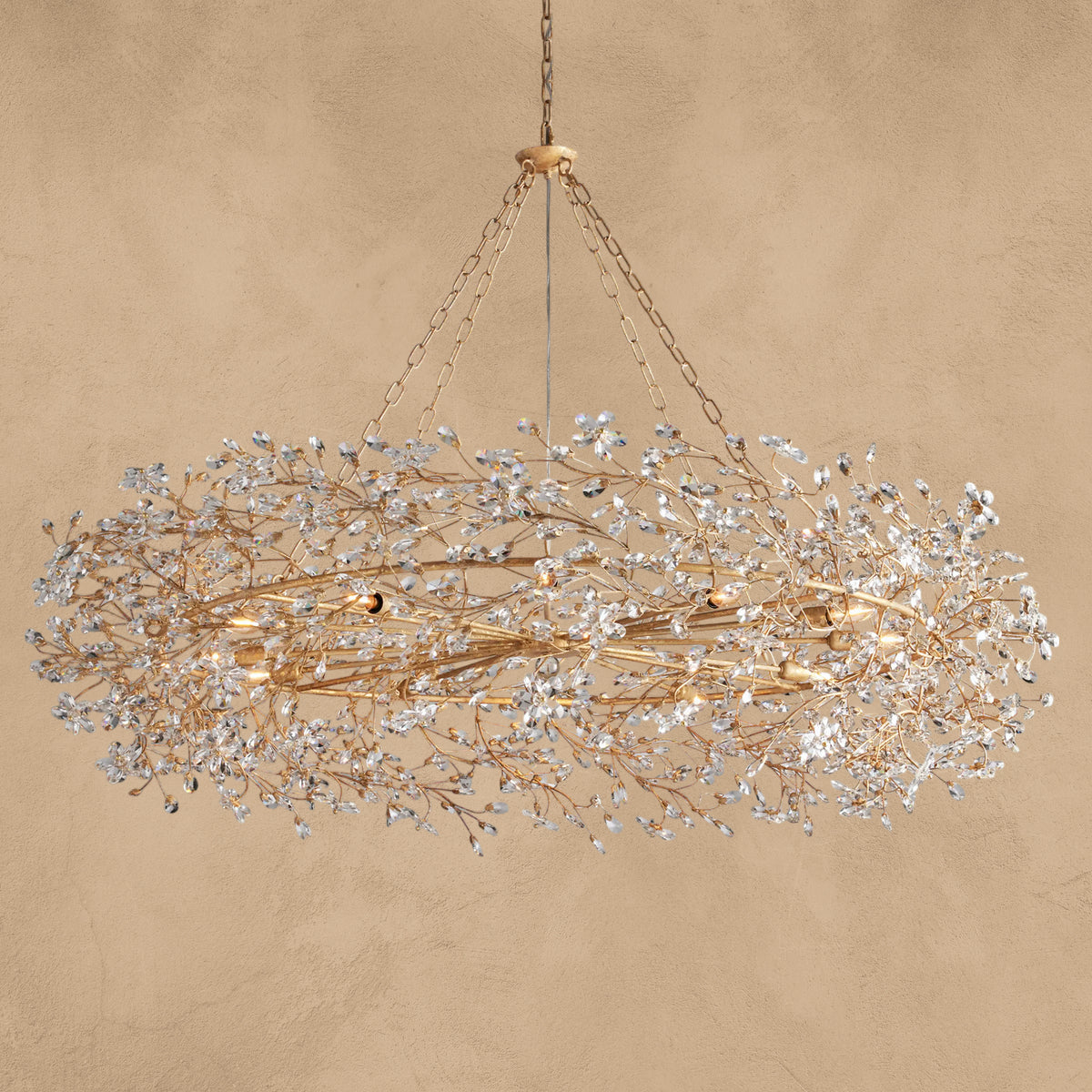 Faverelle chandelier in gold with crystal florals on iron branches, full crown view