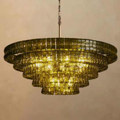 Ghiaccio round chandelier in brass with green glass shades, illuminated