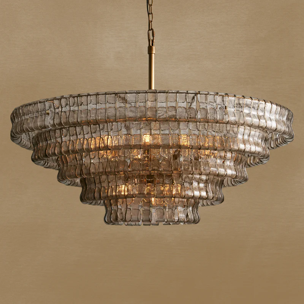 Ghiaccio round chandelier in brass with clear tiered ice-glass shades