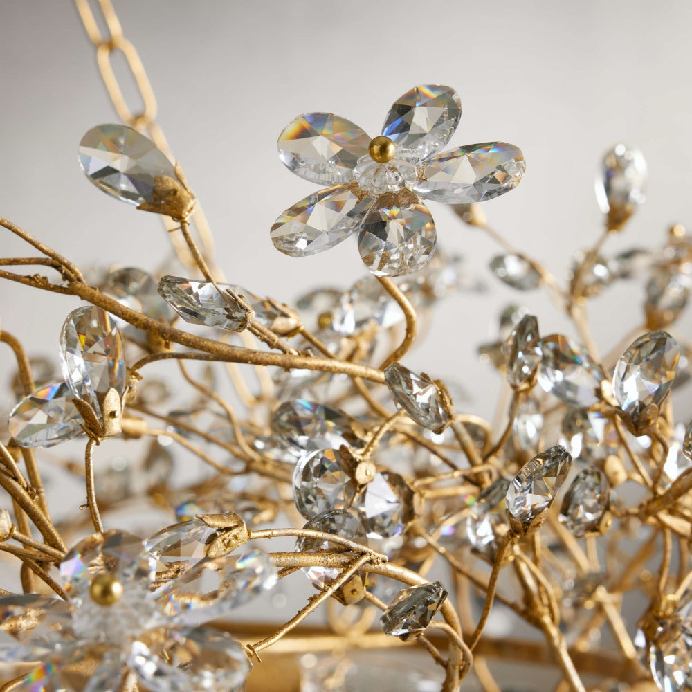 Faverelle chandelier close-up of gold branches set with crystal blossom drops