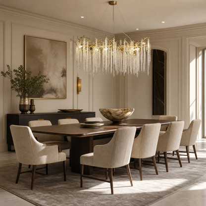 A gold metal branch chandelier with cascading crystal beads suspended in a rainfall arrangement.