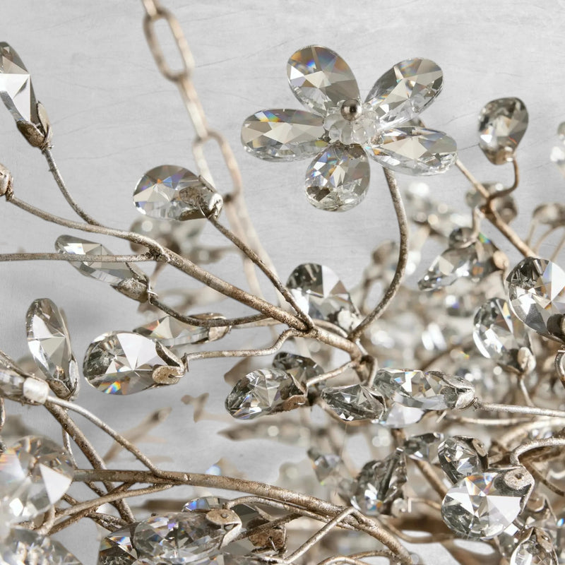 Faverelle chandelier close-up of silver branches and crystal flowers