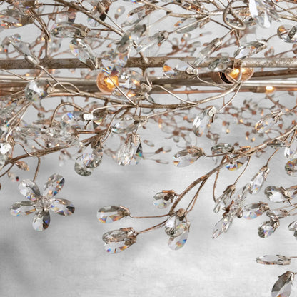 Faverelle chandelier detail of crystal blossoms and drops on the branch frame