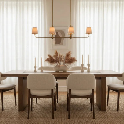 Ancelia Linear Chandelier styled in a modern dining room